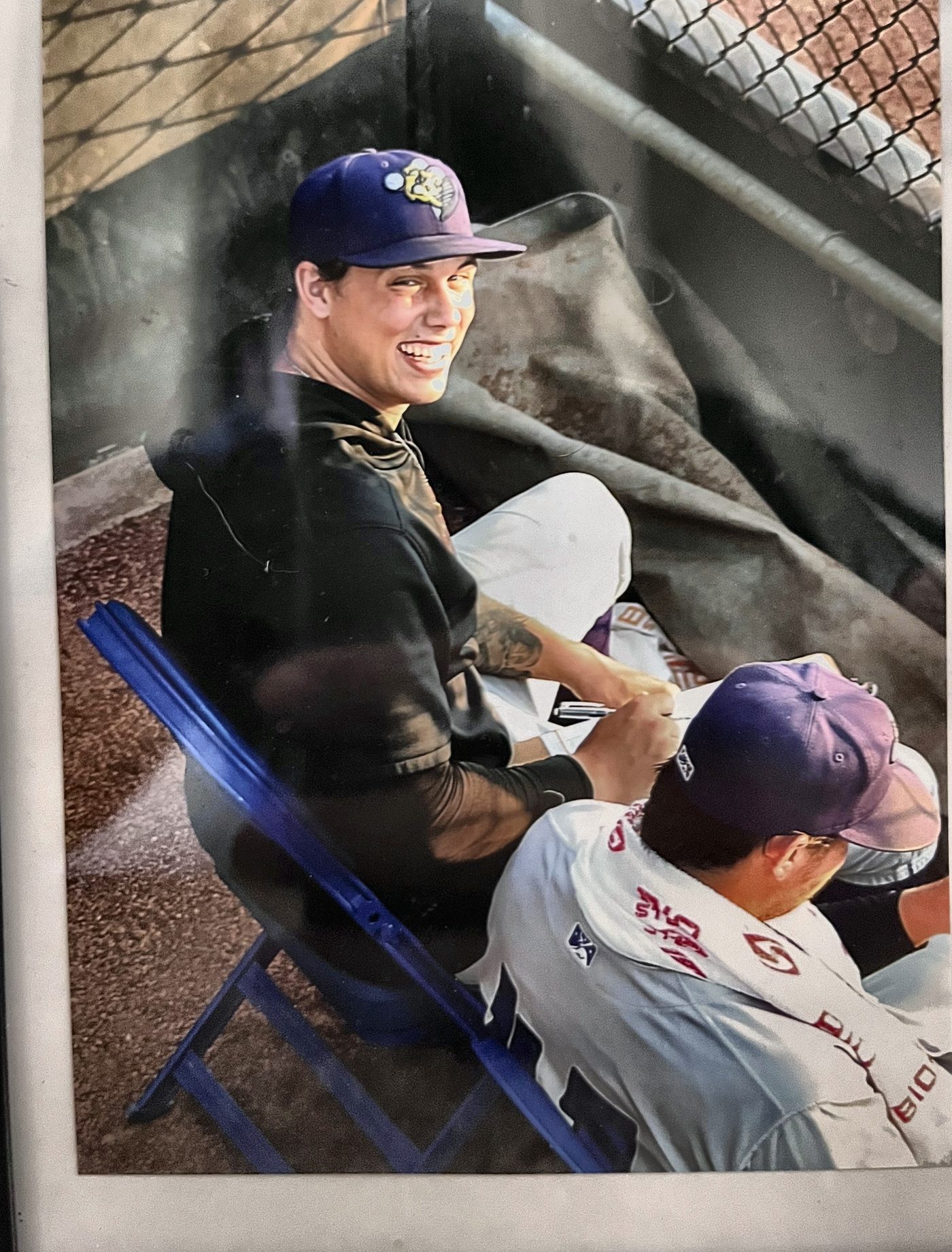 Jackson charting pitches in the dugout during his time with the Twins organization
